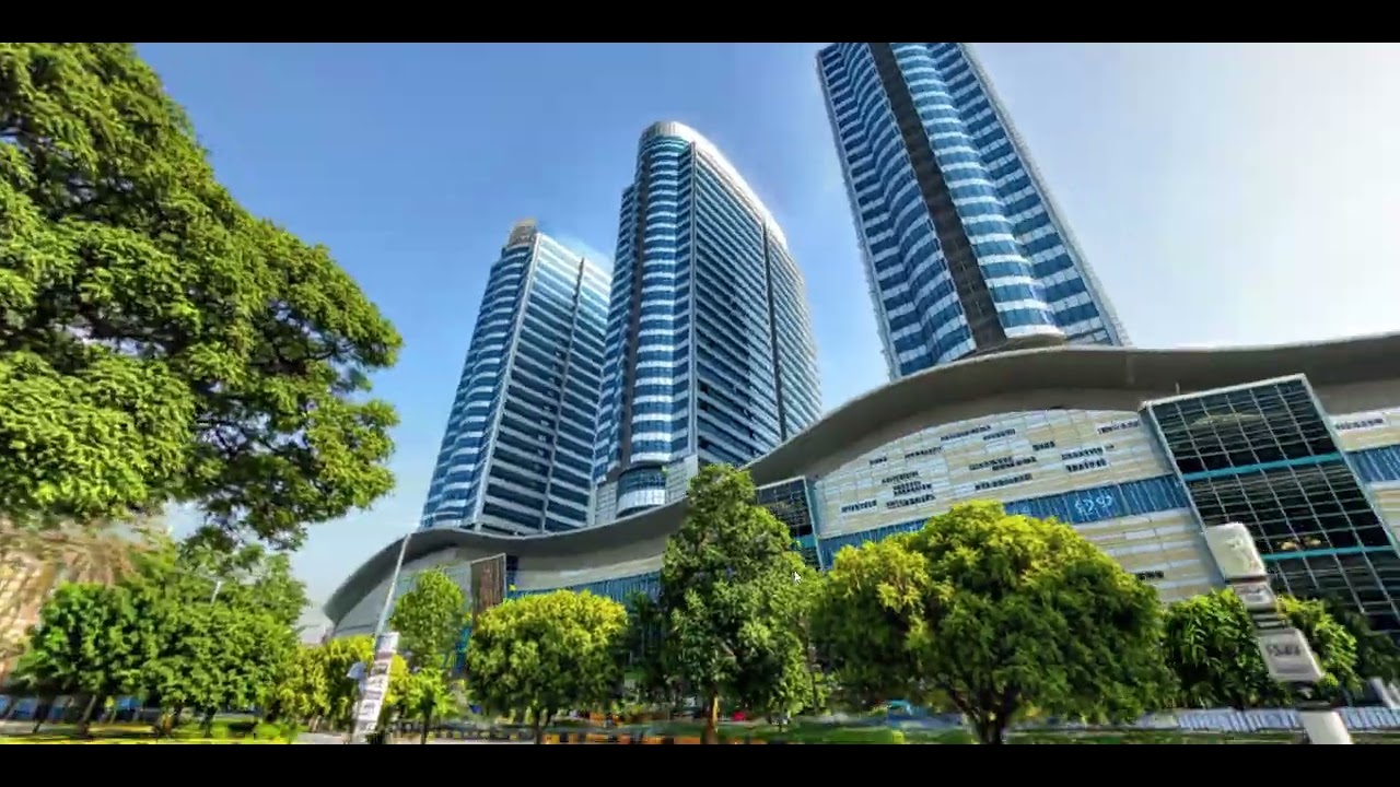 A Gaussian splat reconstruction of a high-rise development captured from ground level