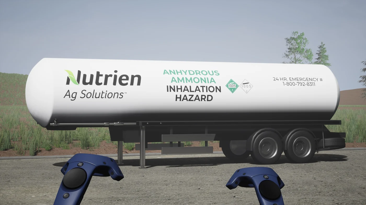 In-headset view of an anhydrous ammonia road tanker marked as an inhalation hazard during VR training
